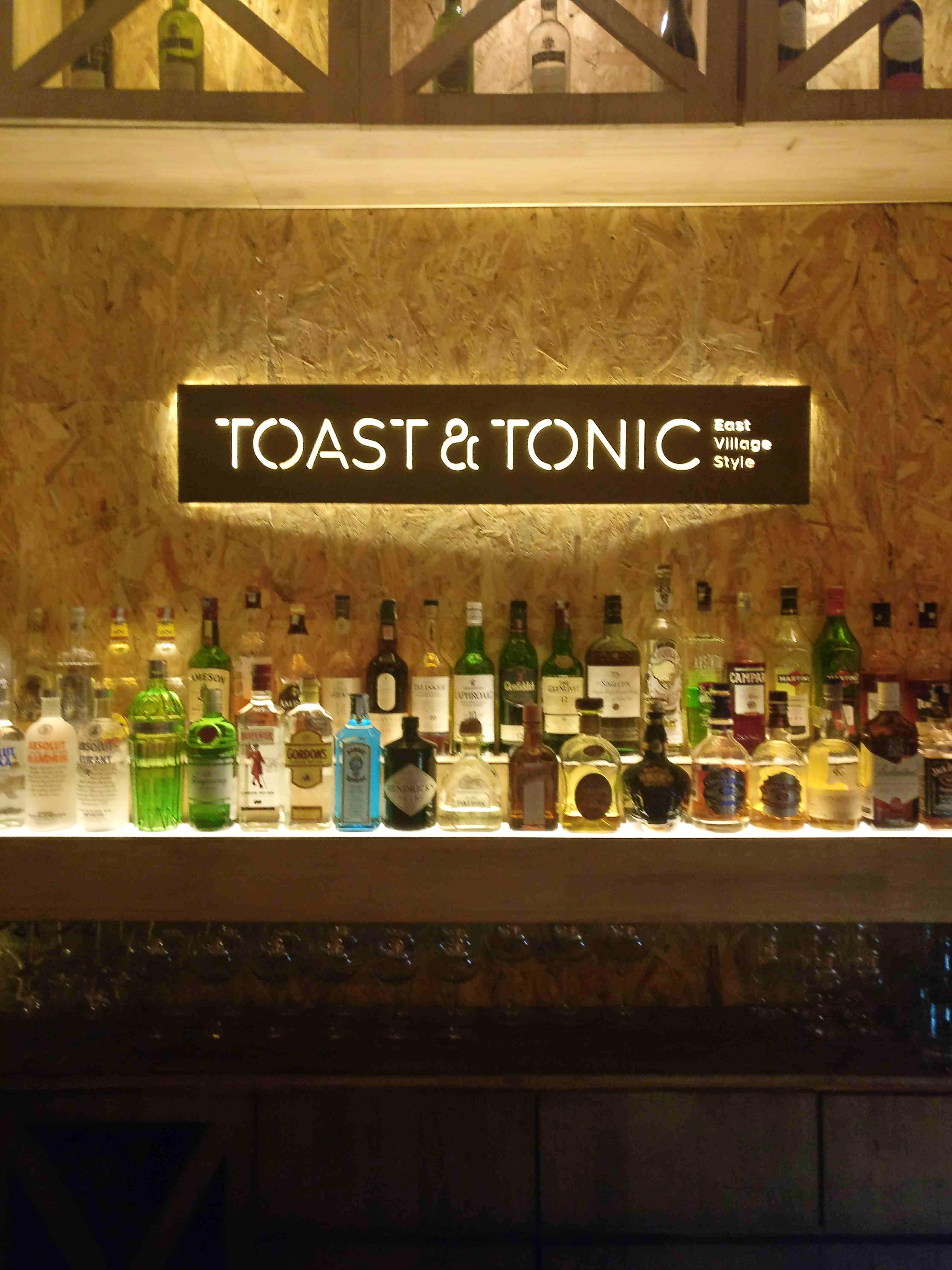 Bar,Liqueur,Alcohol,Drink,Distilled beverage,Glass bottle,Building,Barware,Bottle,Wine bottle