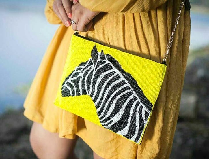 Yellow,Outerwear,Textile,Bag,Street fashion,Jacket,Pattern,T-shirt