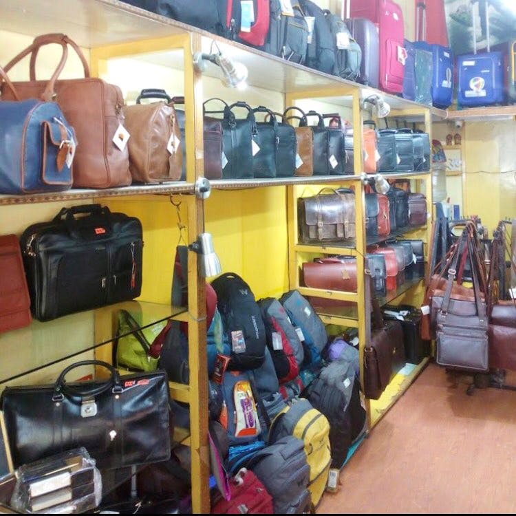 Leather best sale bag store