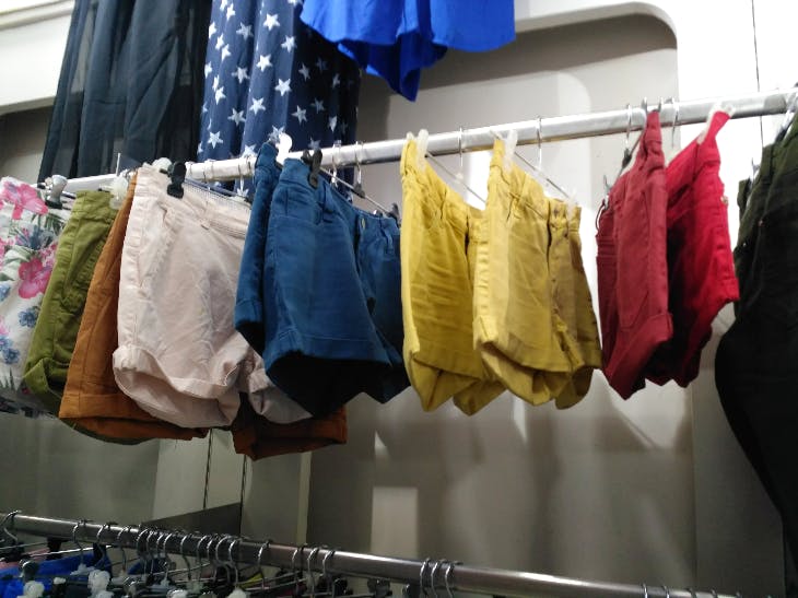 Laundry,Room,Textile,Clothes hanger,Boutique,T-shirt,Closet,Undergarment