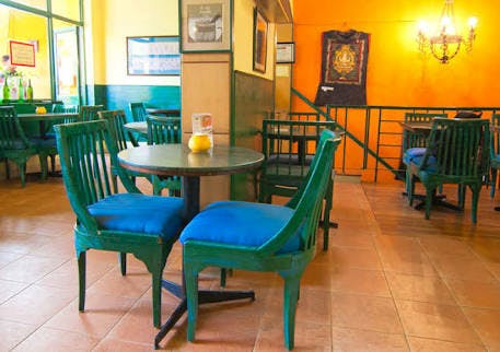 Room,Table,Furniture,Property,Turquoise,Building,Floor,Chair,Restaurant,Interior design