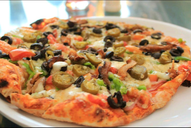 Dish,Food,Pizza,Cuisine,Pizza cheese,California-style pizza,Flatbread,Ingredient,Italian food,Produce