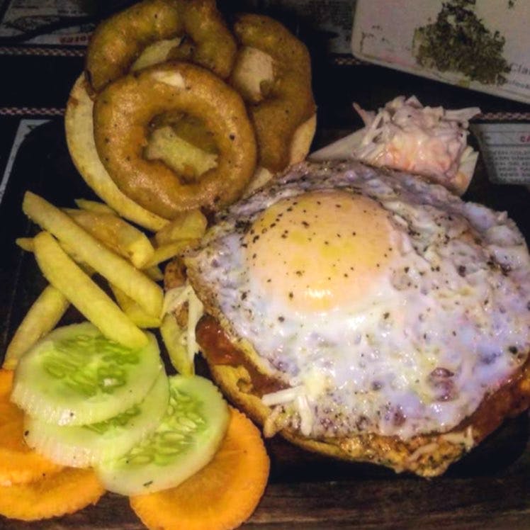 Dish,Food,Cuisine,Fried food,Buffalo burger,Ingredient,Fried egg,Hamburger,Patty,Meal