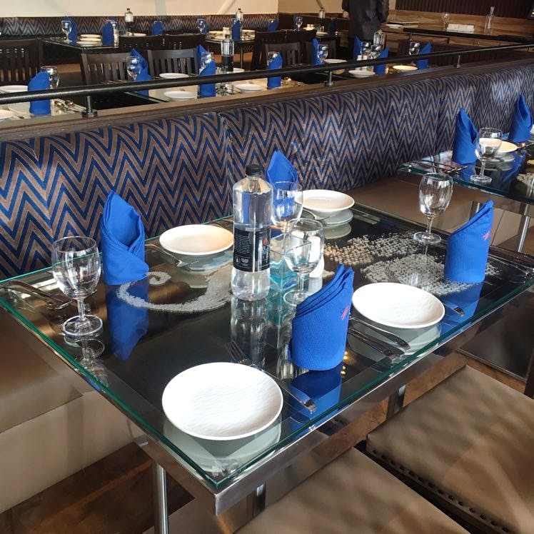 Porcelain,Blue,Table,Cobalt blue,Blue and white porcelain,Room,Countertop,Furniture,Meal,Interior design