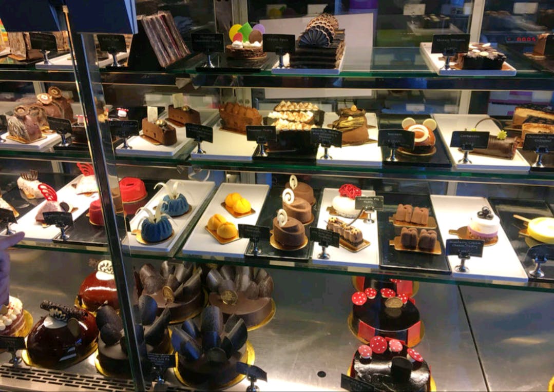 Shoe store,Collection,Footwear,Shoe,Display case,Pastry