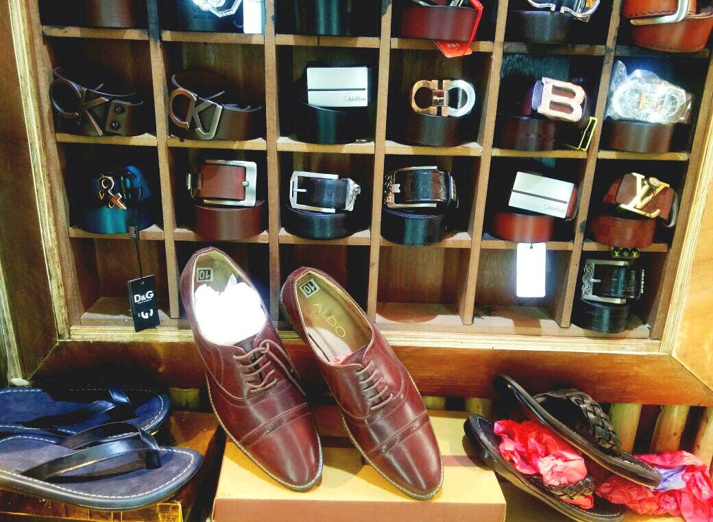 Footwear,Shoe store,Shoe,Collection,Retail,Shelf,Building,Furniture,Athletic shoe