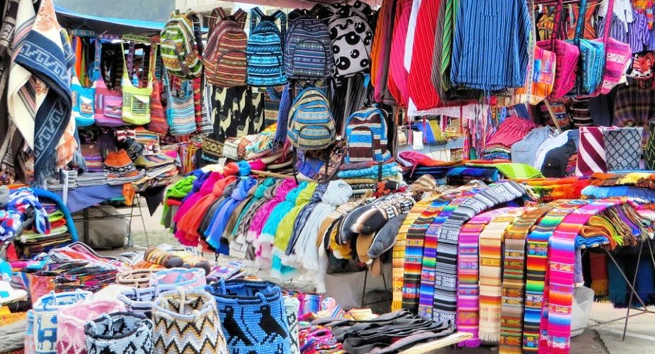 Selling,Bazaar,Market,Public space,Marketplace,Human settlement,Textile,Flea market,Boutique,Outlet store