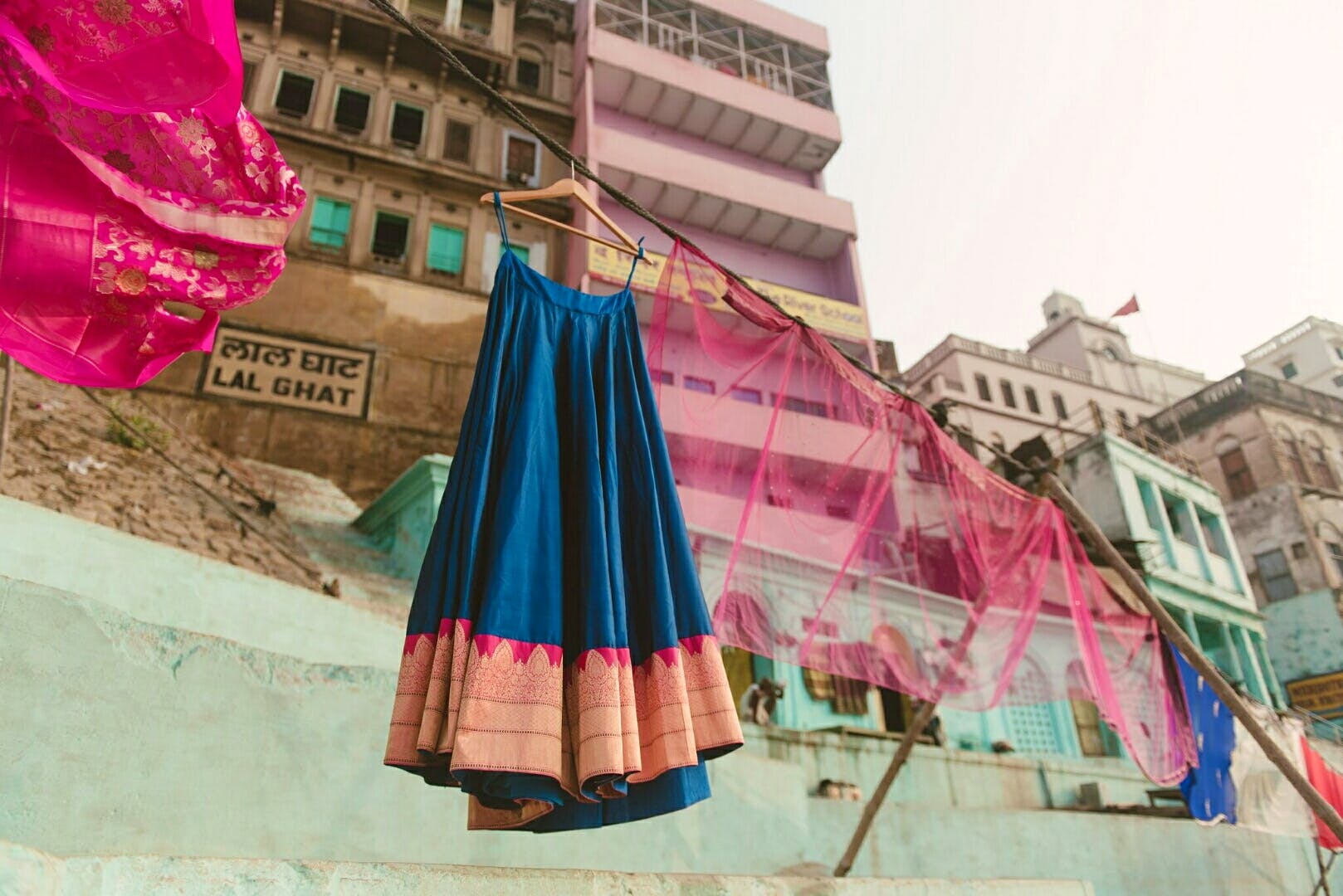 Pink,Blue,Red,Magenta,Textile,Architecture,Outerwear,Dress,Vacation,Window
