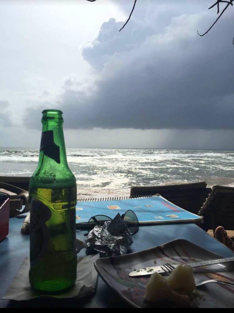 Bottle,Sky,Water,Cloud,Glass bottle,Drink,Ocean,Sea,Beer bottle,Alcohol