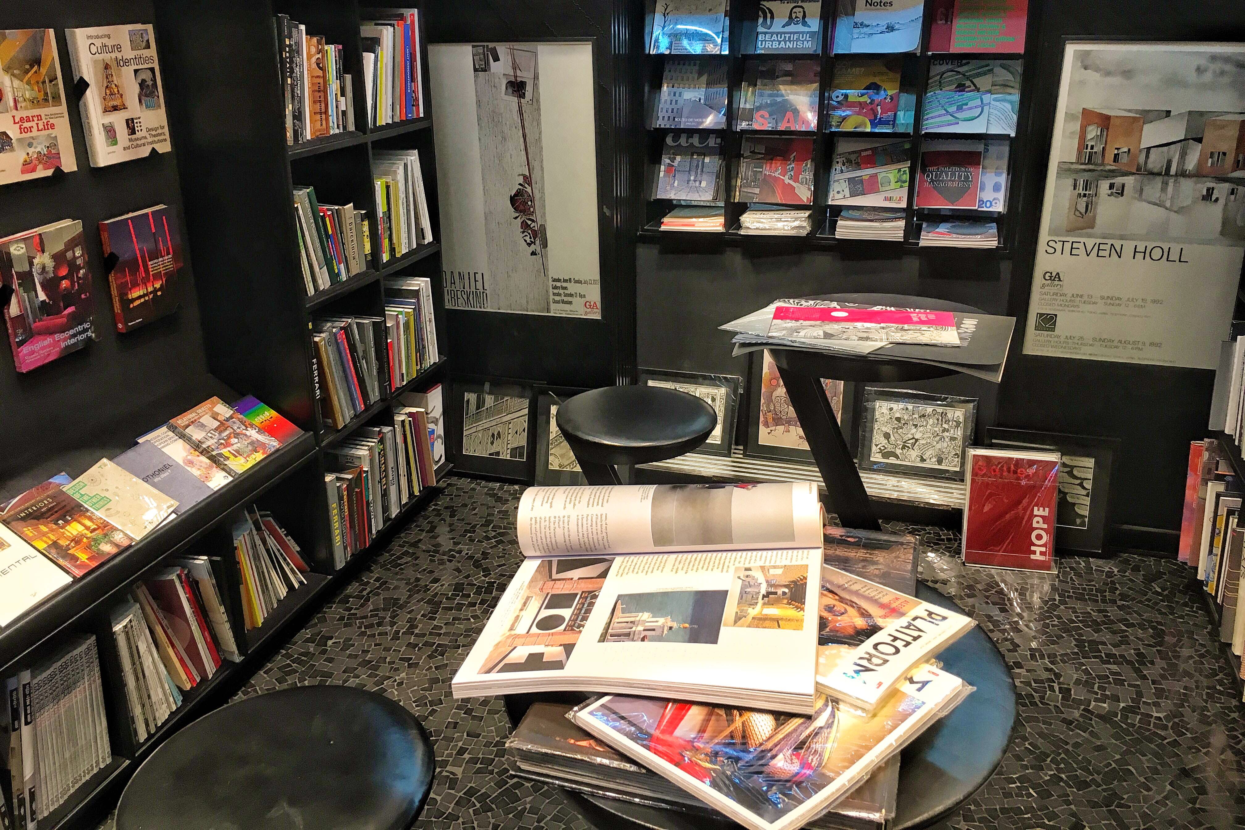 Bookcase,Library,Bookselling,Shelving,Book,Public library,Shelf,Publication,Furniture,Retail