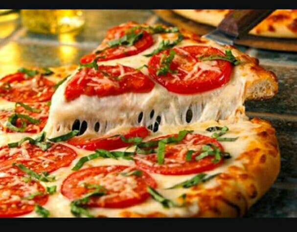 Dish,Food,Cuisine,Pizza cheese,Ingredient,Pizza,Flatbread,Italian food,Garnish,Produce