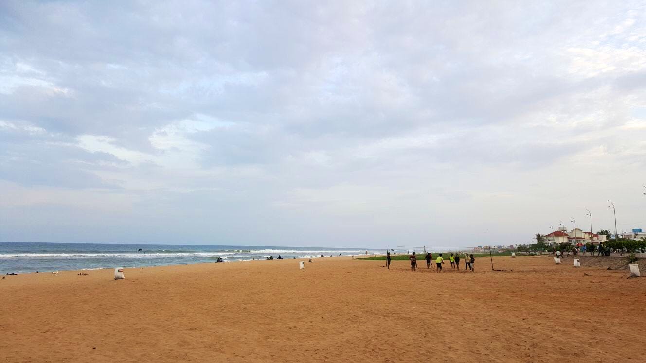 Beach,Body of water,Sea,Coast,Shore,Sky,Sand,Ocean,Horizon,Cloud