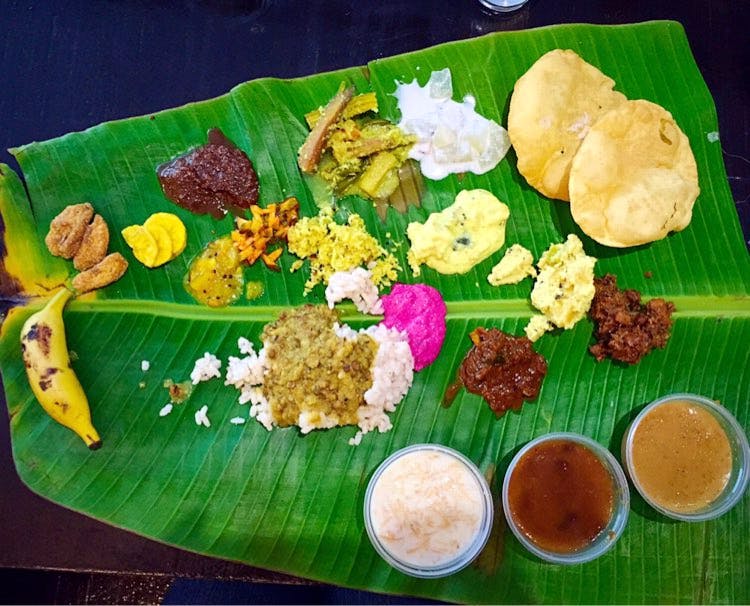 Dish,Food,Cuisine,Sadya,Banana leaf rice,Banana leaf,Andhra food,Tamil food,Ingredient,Leaf