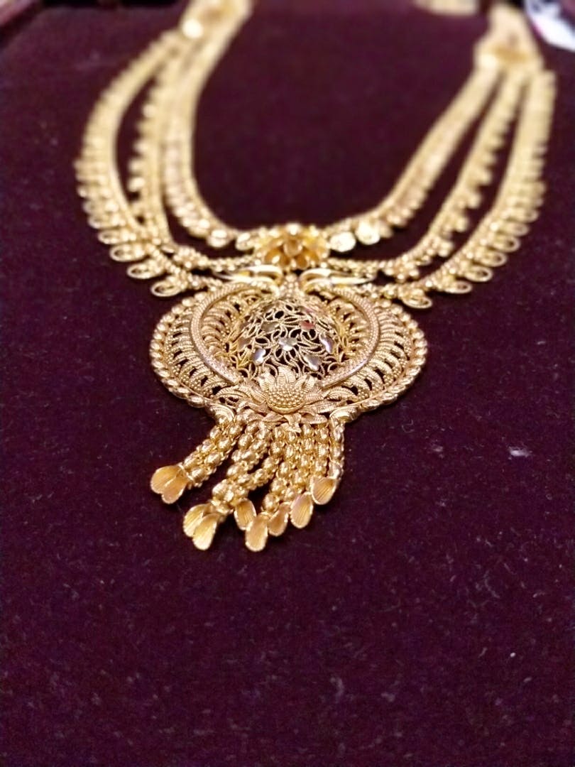 Tanishq hot sale durga pendant