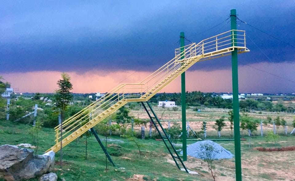 Sky,Architecture,Suspension bridge,Outdoor play equipment,Nonbuilding structure,Amusement park