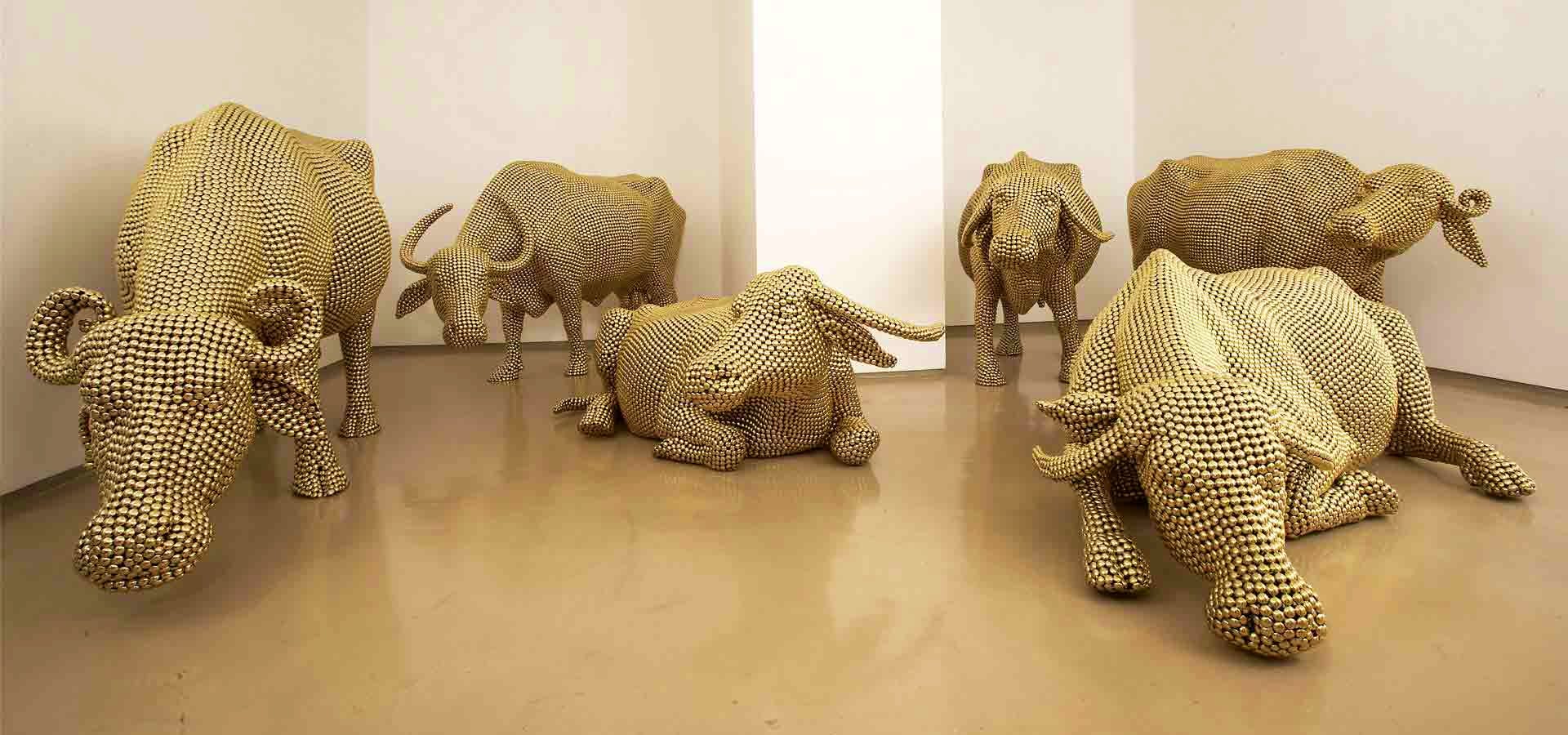 Sculpture,Art,Room,Visual arts,Museum,Rhinoceros,Wildlife,Tourist attraction,Elephant