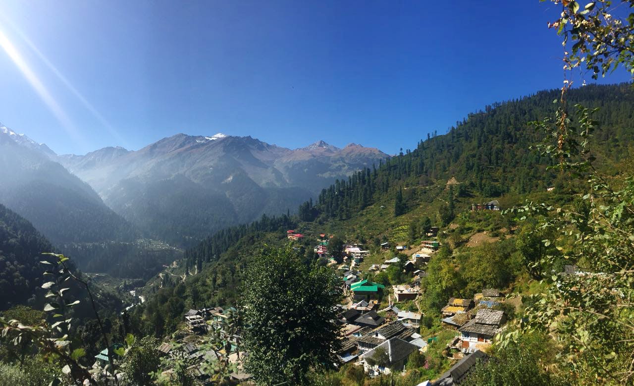 Mountainous landforms,Mountain,Hill station,Sky,Nature,Mountain range,Wilderness,Natural landscape,Tree,Valley