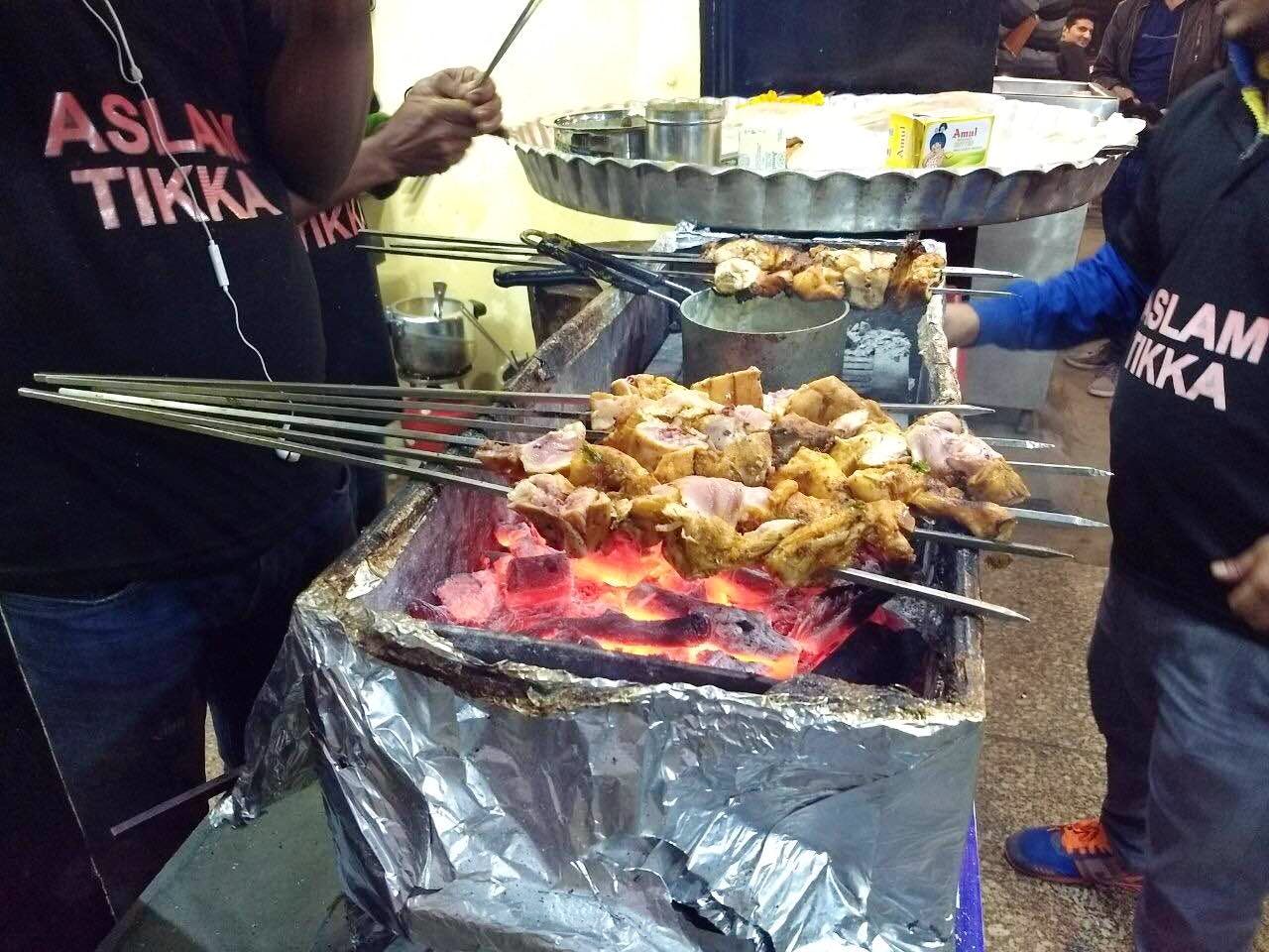 Barbecue,Grilling,Barbecue grill,Food,Roasting,Outdoor grill,Dish,Cuisine,Cooking,Street food