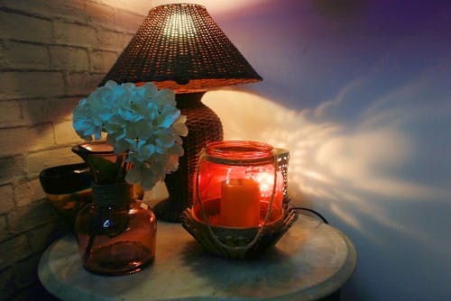 Lampshade,Lighting,Lamp,Lighting accessory,Blue,Light,Light fixture,Nightlight,Table,Still life photography