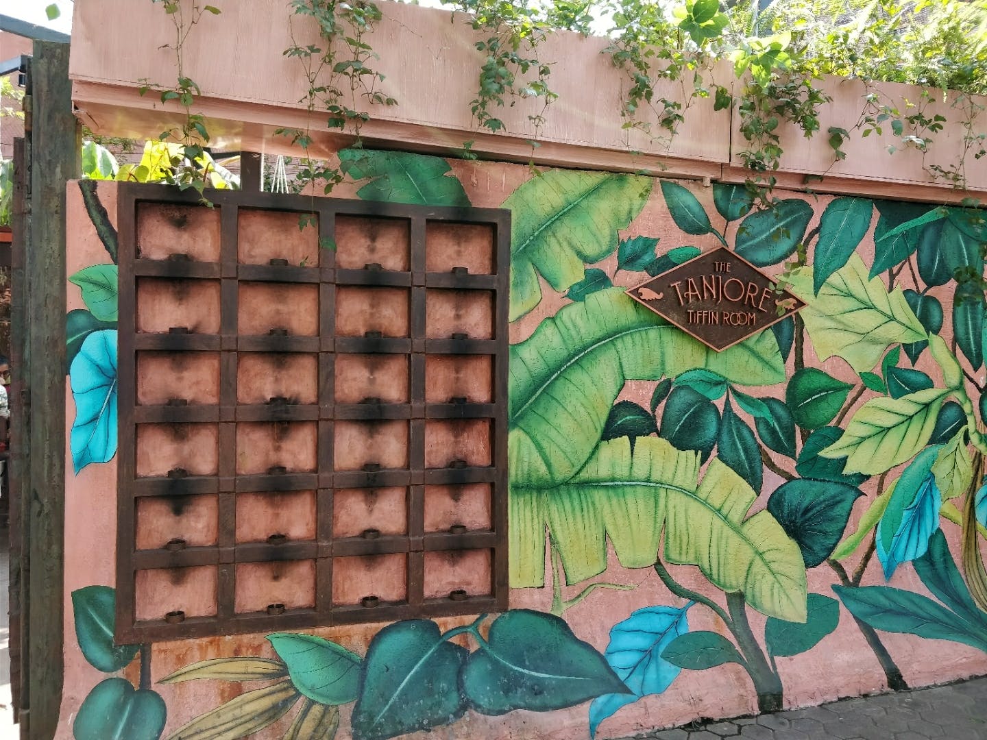 Leaf,Wall,Mural,Plant,Facade,Art,Street art,House