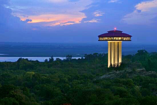 Sky,Landmark,Observation tower,Sea,Architecture,Cloud,Tourist attraction,Tower,Horizon,Tree