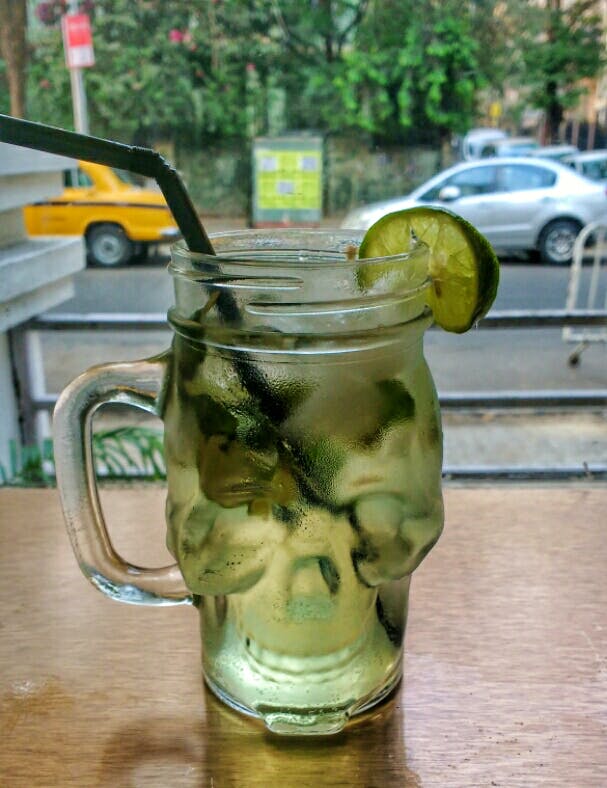 Drink,Alcoholic beverage,Drinkware,Mojito,Lemonade,Non-alcoholic beverage,Glass,Tableware,Caipirinha,Distilled beverage