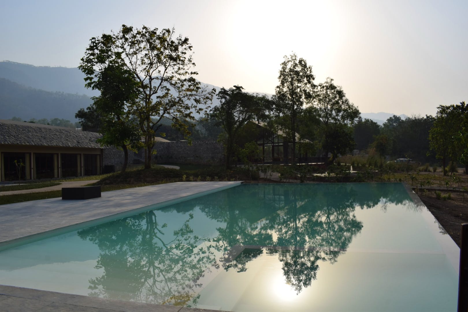 Swimming pool,Property,Resort,Reflecting pool,Water,House,Tree,Estate,Leisure,Real estate
