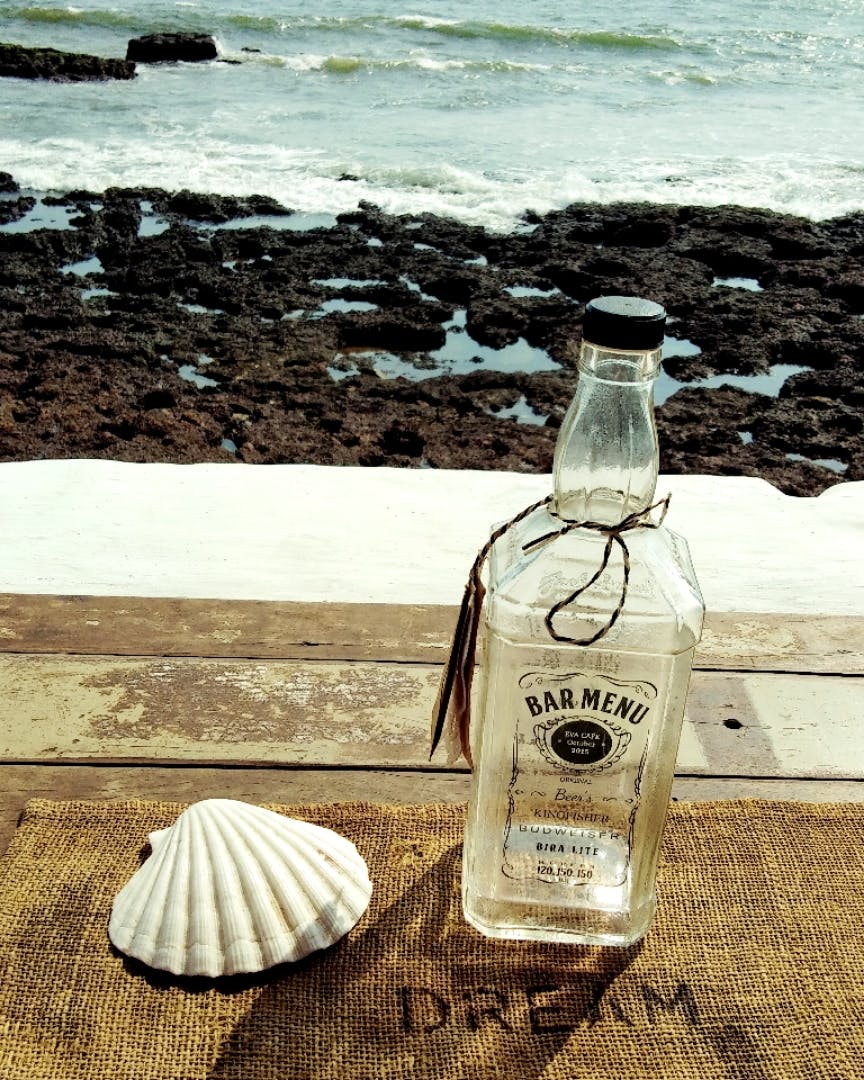 Bottle,Water,Glass bottle,Drink,Liqueur,Beach,Sand,Shore,Alcohol,Sea