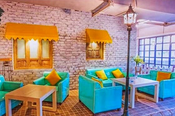 Room,Property,Interior design,Building,Turquoise,Furniture,Wall,Table,House,Ceiling