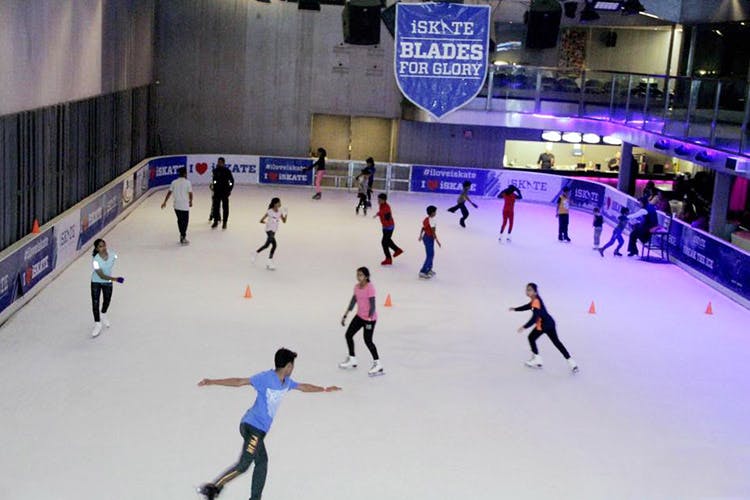 Skating,Ice rink,Ice skating,Ice skate,Sports,Recreation,Building,Sports equipment,Winter sport,Ice
