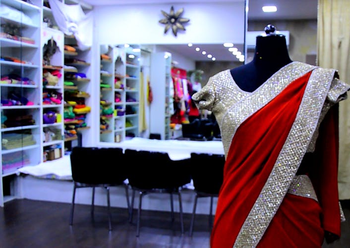 Boutique,Clothing,Fashion,Fashion design,Dress,Textile,Room,Retail,Magenta,Formal wear