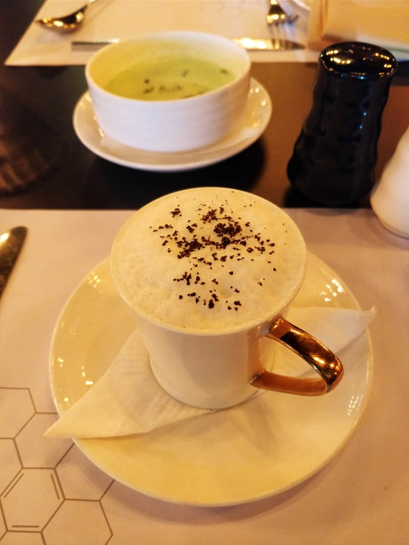 This Multi-cuisined Mulund Restaurant serves Mushroom Cappuccino  and A Live Dessert