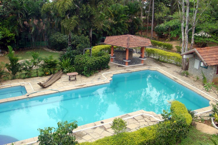 Swimming pool,Property,Leisure,Resort,Backyard,House,Real estate,Eco hotel,Building,Estate