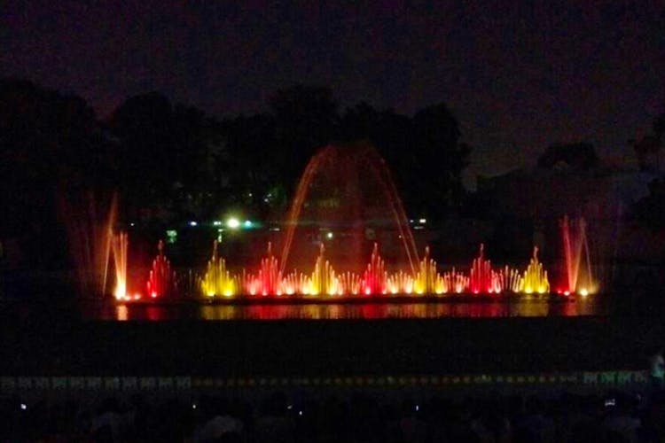Fountain,Water feature,Night,Light,Lighting,Darkness,Stage,Midnight,Fire