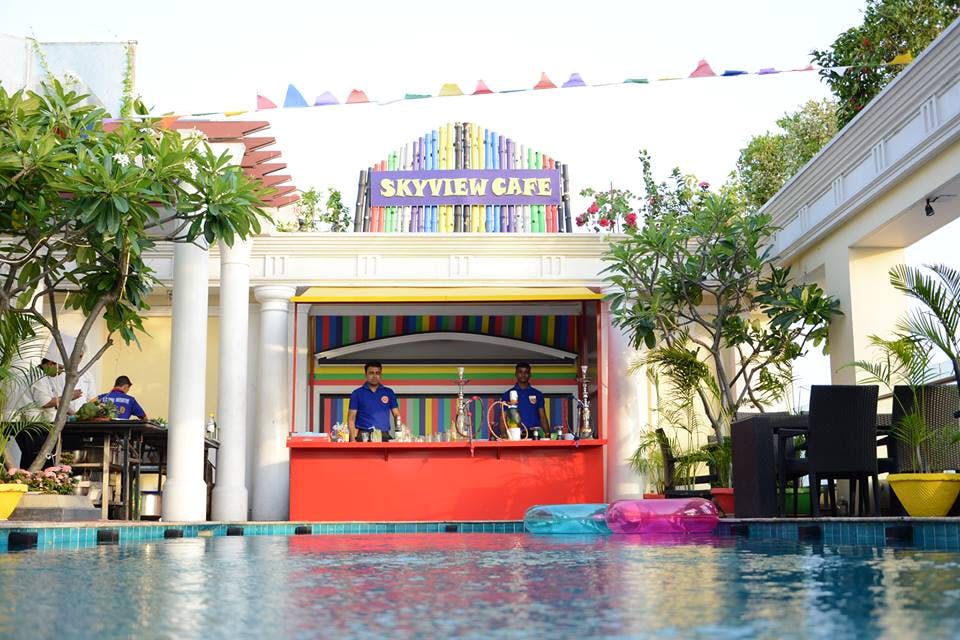Building,Majorelle blue,Architecture,Vacation,Swimming pool,House,Leisure,Design,Resort,Tourism