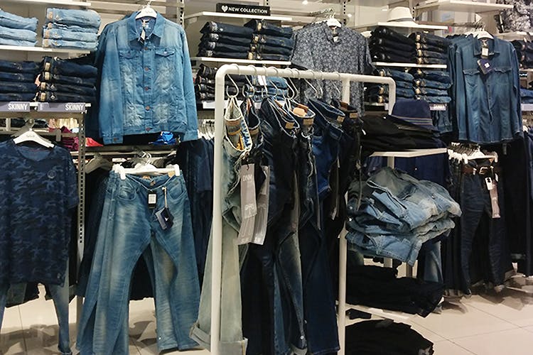 Jeans,Denim,Clothing,Boutique,Textile,Trousers,Retail,Clothes hanger