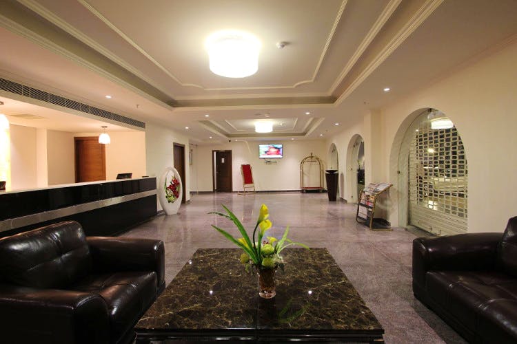 Lobby,Building,Room,Interior design,Property,Ceiling,Lighting,Architecture,House,Real estate