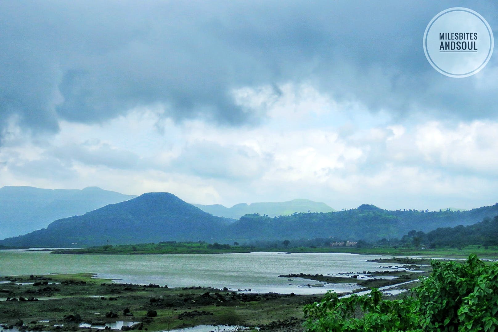 Highland,Sky,Nature,Natural landscape,Water,Cloud,Water resources,Hill station,Mountain,Mountainous landforms