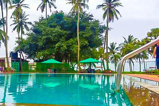 Swimming pool,Resort,Leisure,Vacation,Palm tree,Tree,Tropics,Leisure centre,Fun,Eco hotel