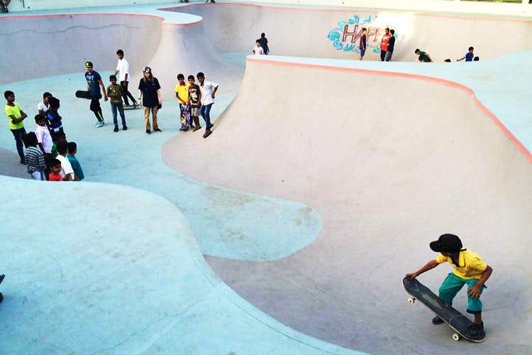 Sport venue,Skatepark,Skateboarding,Recreation,Leisure,Concrete,Kickflip,Sports equipment,Extreme sport,Art