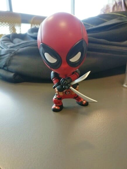 Deadpool,Red,Superhero,Fictional character,Spider-man,Carmine,Animation,Action figure,Fiction,Toy