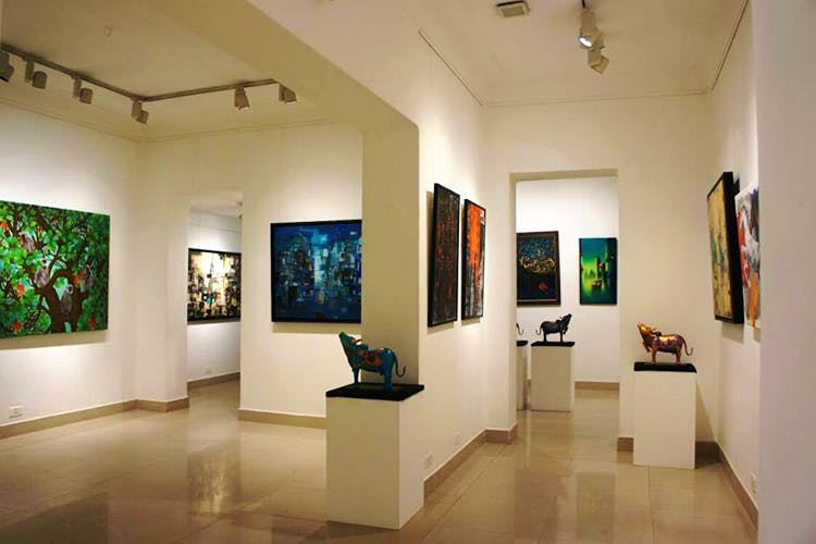 Art gallery,Museum,Art exhibition,Exhibition,Tourist attraction,Building,Art,Interior design,Collection,Vernissage