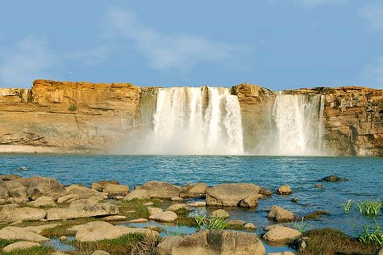 Waterfall,Body of water,Natural landscape,Water resources,Nature,Water,Watercourse,Nature reserve,Water feature,Sky