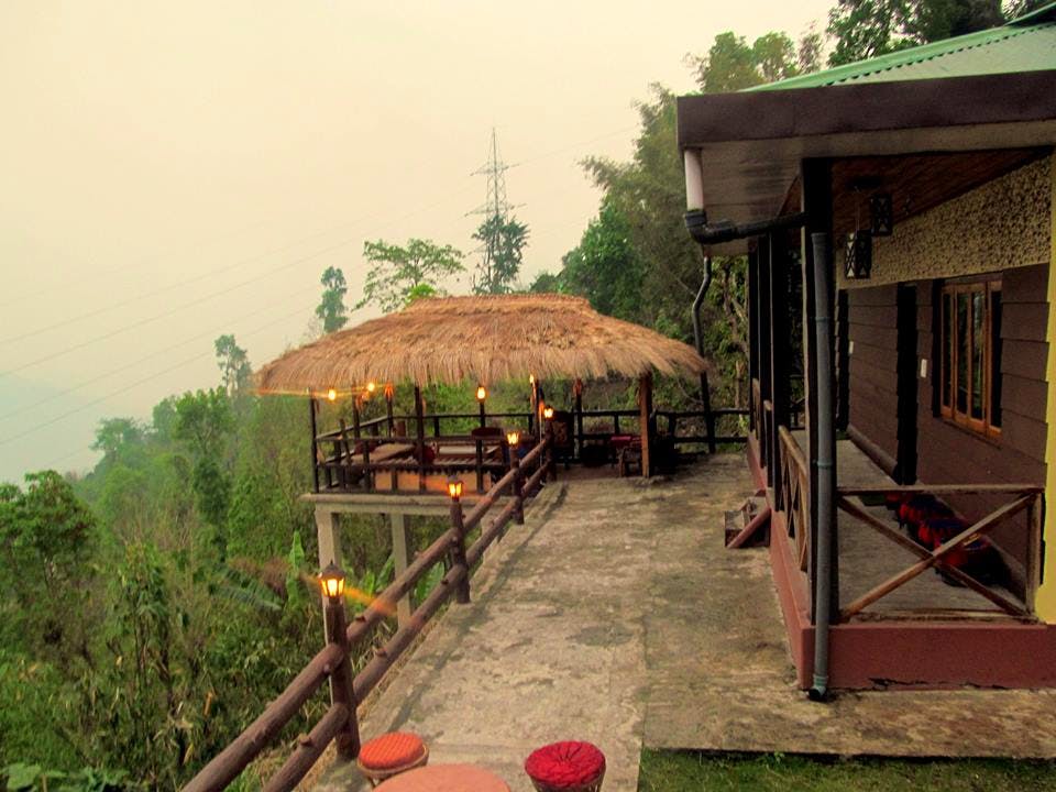 Building,Leisure,Hut,House,Eco hotel,Landscape,Cottage,Hill station,Resort,Tourism