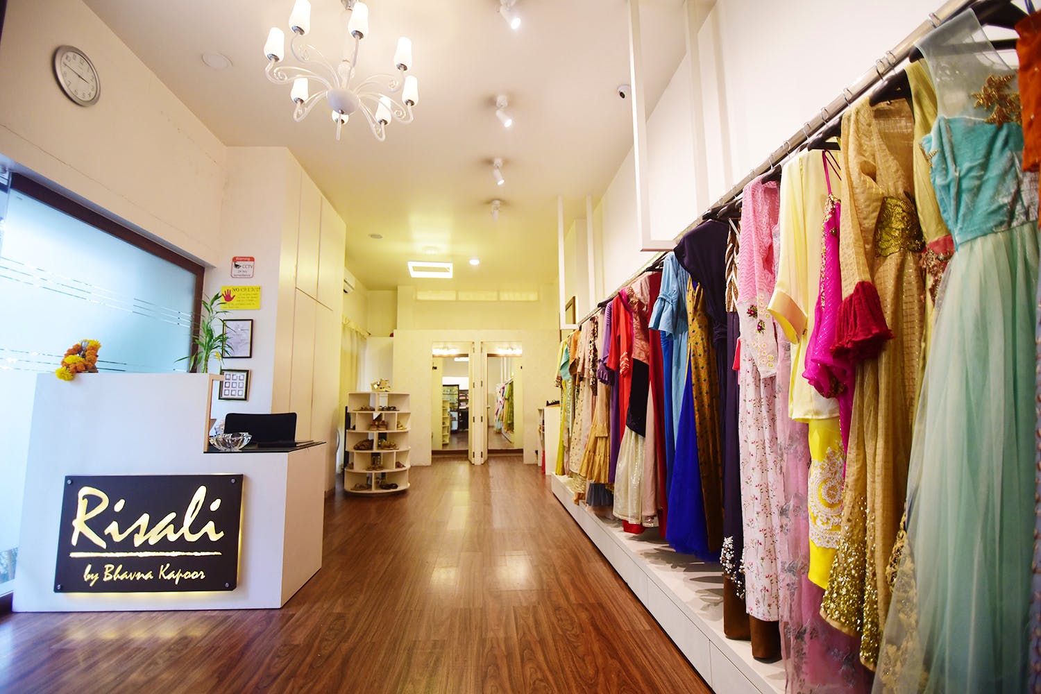 Boutique,Building,Ceiling,Interior design,Fashion,Room,Outlet store,Dress,Floor,Flooring