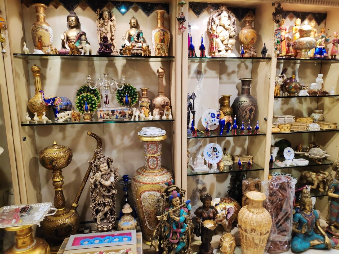 Collection,Souvenir,Ceramic,Toy,Antique,Display case,Porcelain,Art,Bazaar,Building