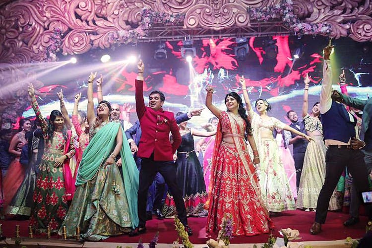 Event,Ceremony,Performance,Stage,Musical,Sari,Musical theatre,Formal wear,Magenta,Theatrical property