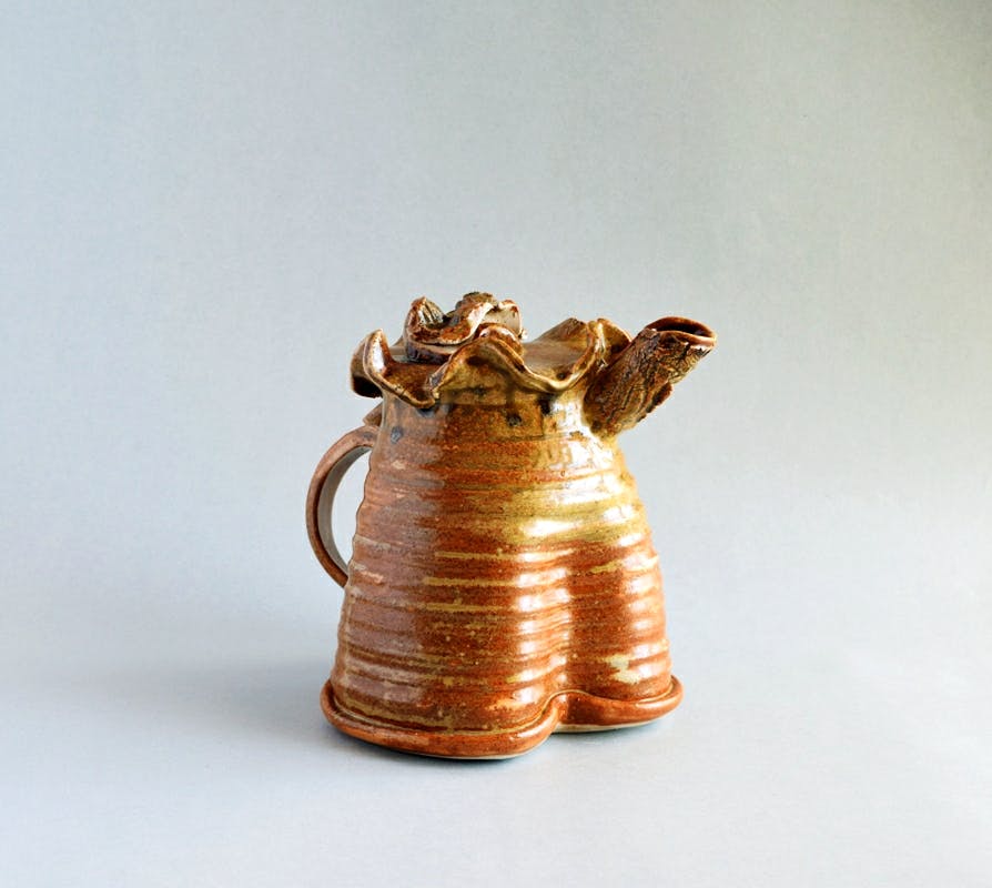 earthenware,Copper,Jug,Metal,Ceramic,Brass,Sculpture,Vase,Serveware,Artifact