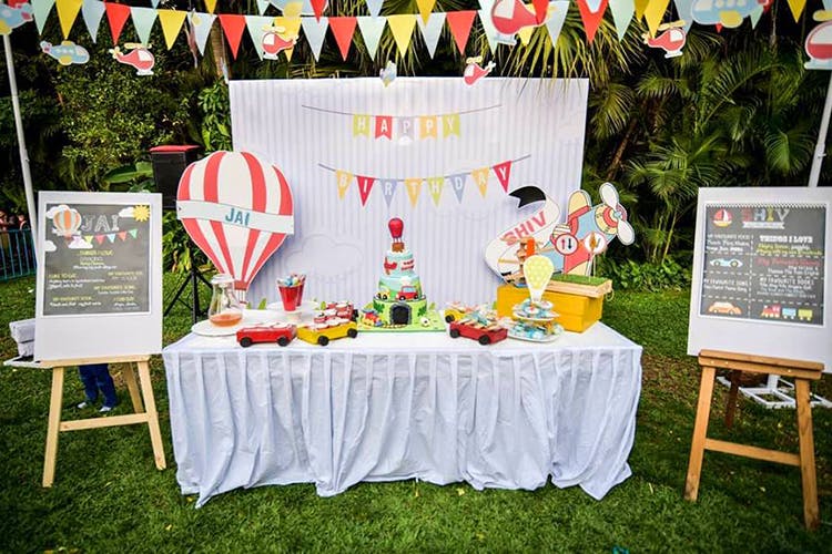 Linens,Event,Tablecloth,Party,Textile,Table,Wedding reception,Grass,Backyard,Recreation