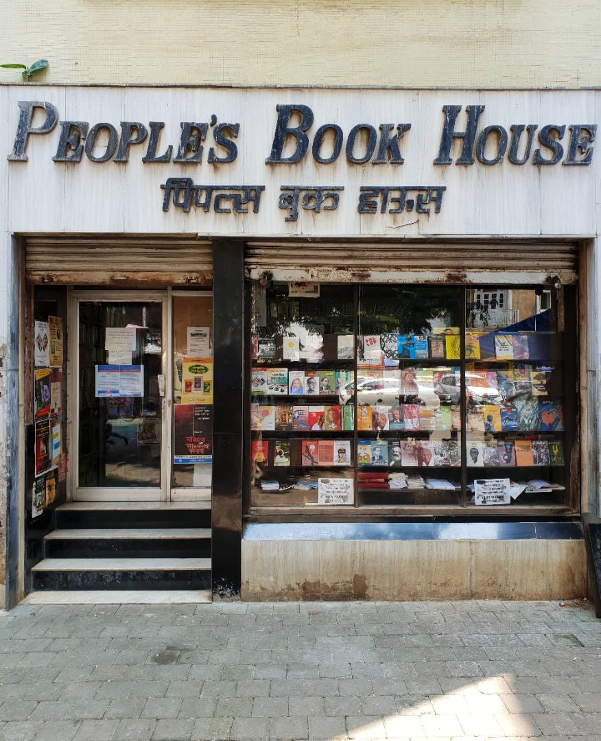 Building,Retail,Bookselling,Facade,Font,Street,Door,Window,Signage